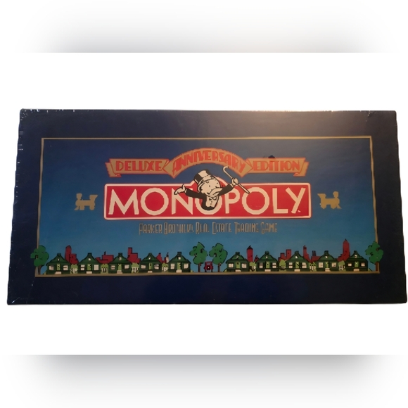 Monopoly Other - Vintage Sealed Monopoly Deluxe Anniversary Edition. W/ anniversary gold train.